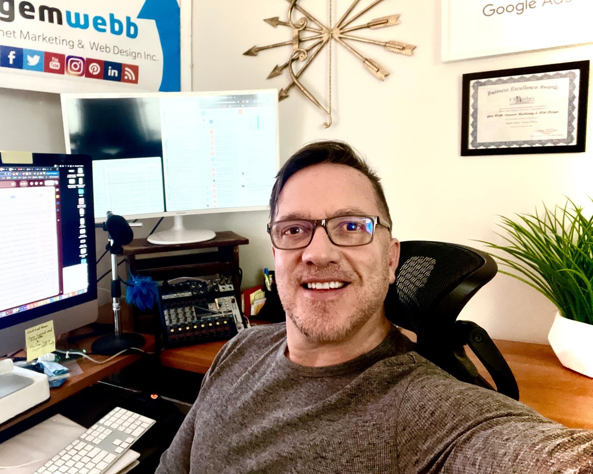 Gem Webb at his desk in the office