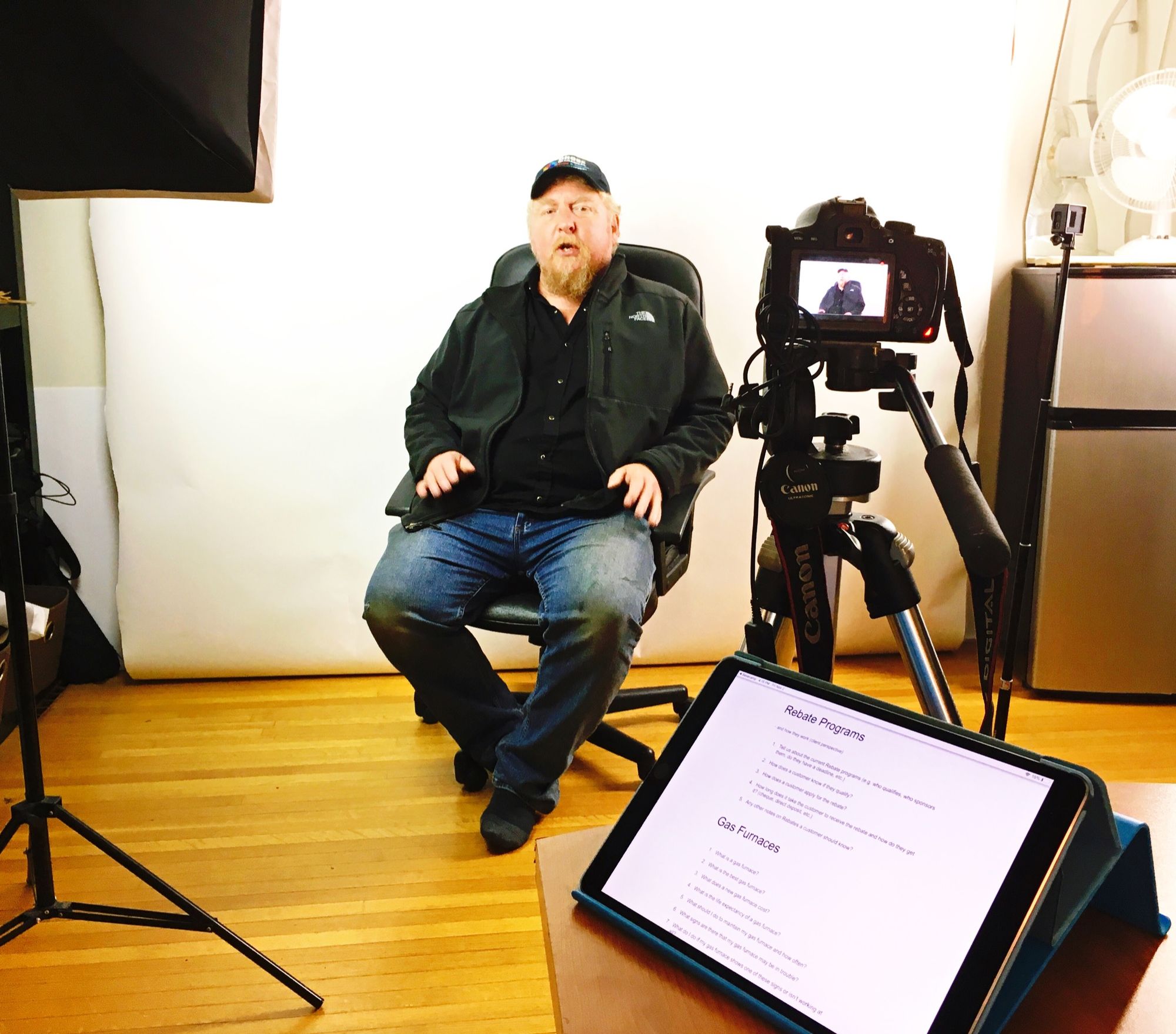 Gem filming a client interview in the shop